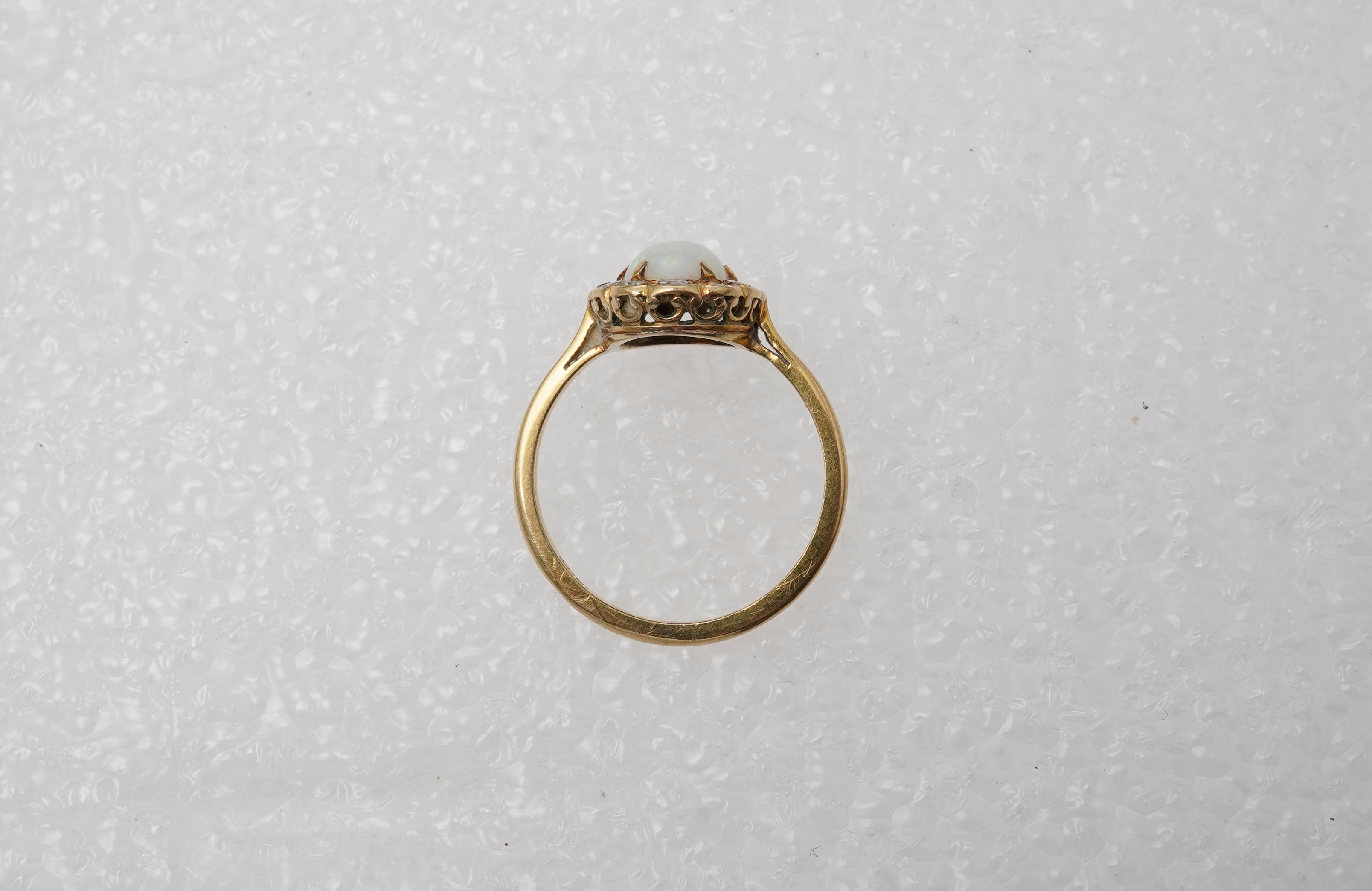 An opal and diamond cluster ring, mid 20th century